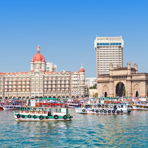 MUMBAI, INDIA - FEBRUARY 21: The Taj Mahal Palace Hotel and Gateway of India on Febuary 21, 2014 in Mumbai, India.